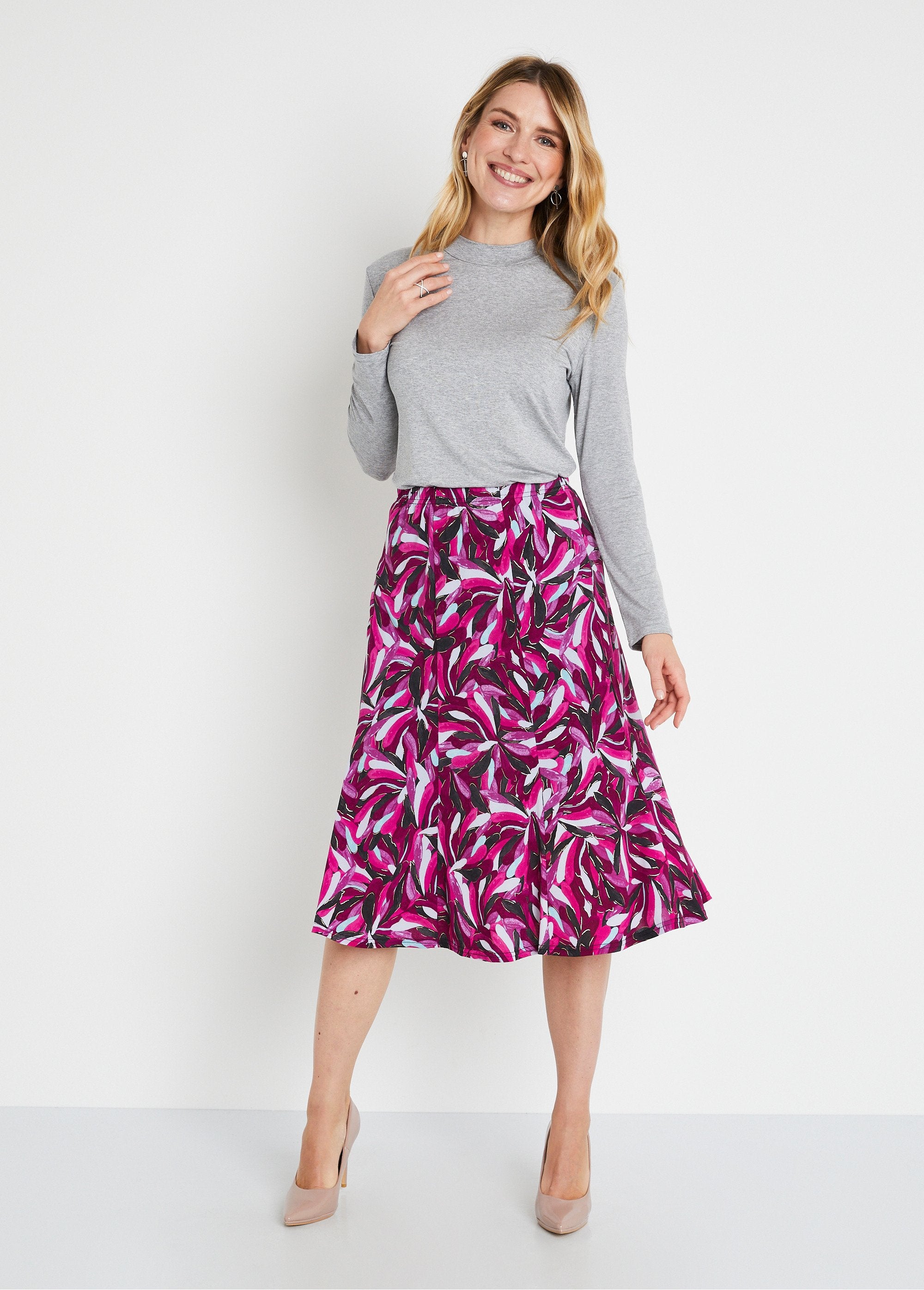 Mid-length_flared_skirt_in_shiny_thread_print_Fuchsia_prints_SF1_slim