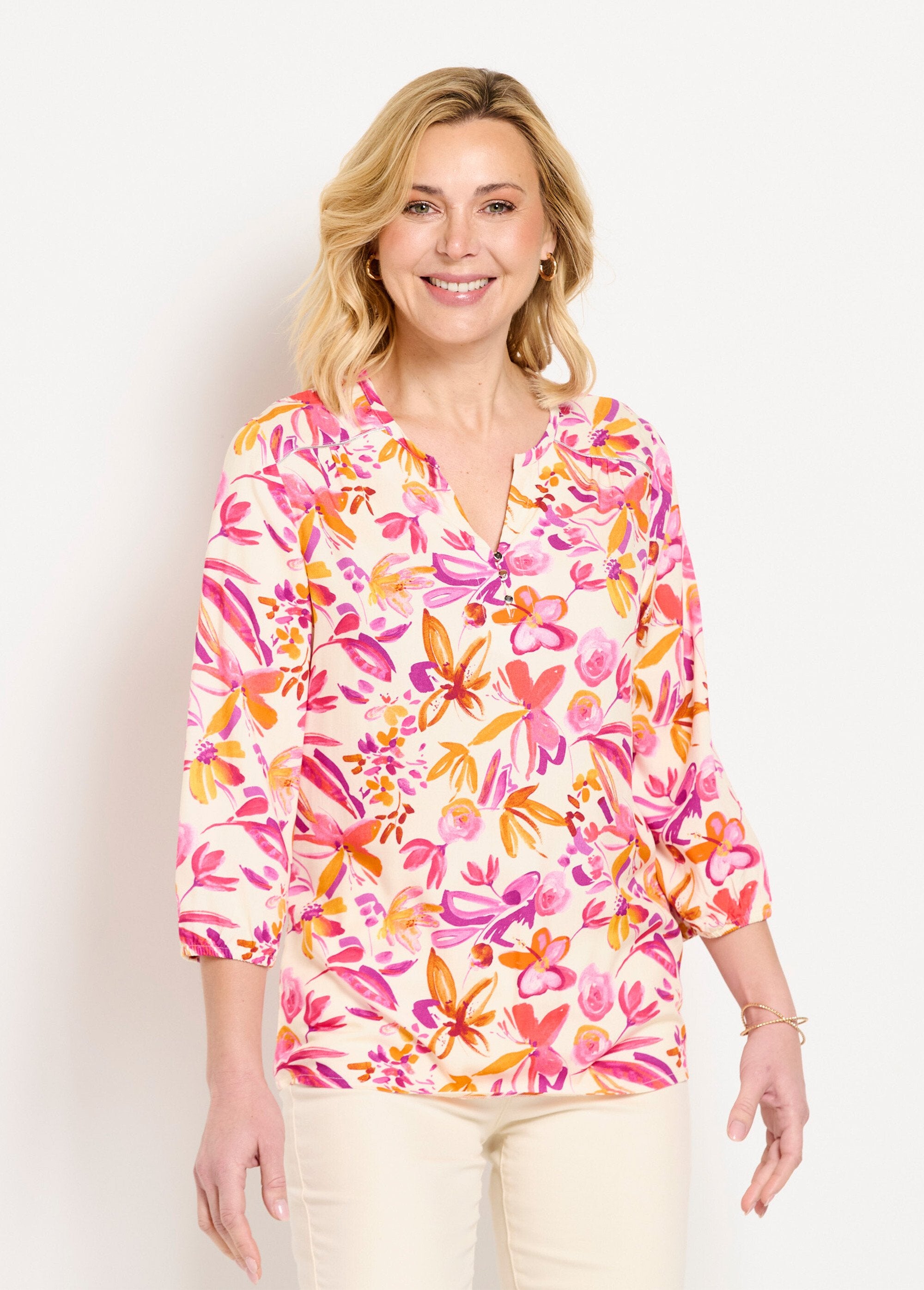 Long_loose_floral_tunic_with_3/4_sleeves_Orange_and_pink_FA1_slim